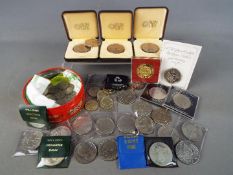 Numismatology - a collection of UK coins to include 15 off £5 commemorative coins, 5 off £2 coins,