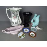 A mixed lot of ceramics to include black Wedgwood, Corona ware,