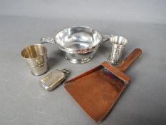 Lot to include a pewter Quaich, copper sovereign shovel,
