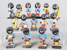 A collection of Robertson's 'Golly' figures, musicians and footballers.