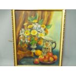 A framed still life oil on board, titled verso 'Autumn Flowers & Fruit With Old Jug',