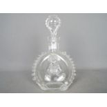 A Remy Martin decanter by Baccarat, with stopper.