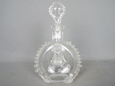 A Remy Martin decanter by Baccarat, with stopper.