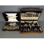 A oak cased canteen of cutlery and a further cased set (2)