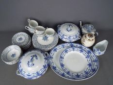 A collection of various blue and white dinner and tea wares and a Masons ironstone ginger jar.