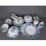 A collection of various blue and white dinner and tea wares and a Masons ironstone ginger jar.