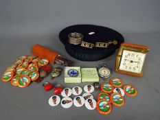 A mixed lot of collectables to include a Boys Brigade / Life Boys cap, dip pens, military badges,