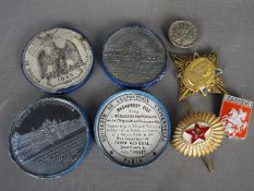 A small lot to include Russian badges,