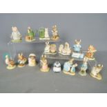 A collection of Beatrix Potter character figurines by FW & Co and Border Fine Arts.