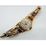 A lady's Accurist wristwatch (gold filled) on expanding bracelet stamped '9ct Gold Metal Fittings',