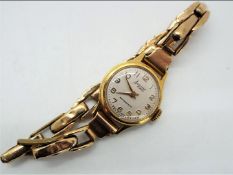 A lady's Accurist wristwatch (gold filled) on expanding bracelet stamped '9ct Gold Metal Fittings',