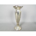 A George V hallmarked silver vase, Chester assay 1929, sponsors mark for Walker & Hall,