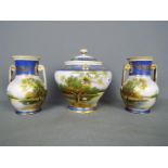 Noritake - A pair of twin handled vases decorated with a swan on a lake and a similarly decorated