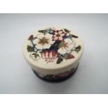 A Moorcroft lidded pot in the Bramble Revisited design Condition Report: Appears in very good