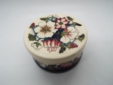 A Moorcroft lidded pot in the Bramble Revisited design Condition Report: Appears in very good