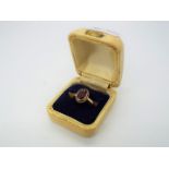 9 ct Gold - a 9ct gold ring, stone set, size L, approx weight 2.