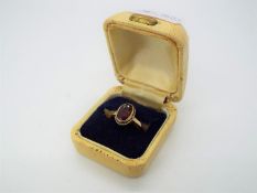 9 ct Gold - a 9ct gold ring, stone set, size L, approx weight 2.