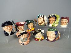 Royal Doulton - A collection of nine small Royal Doulton character jugs comprising Town Crier,