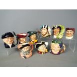 Royal Doulton - A collection of nine small Royal Doulton character jugs comprising Town Crier,