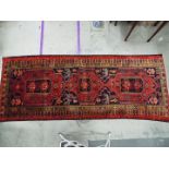 A large Persian runner measuring approximately 121 cm x 310 cm