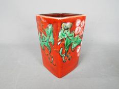 An Anita Harris holly and berries vase, approx height 11.