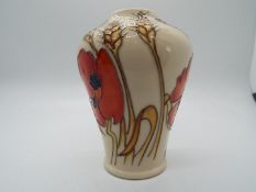 A Moorcroft vase in the Harvest Poppy design,