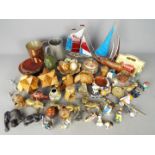 A mixed lot of collectables to include figurines, treen, cloisonné vase, metalware and similar.