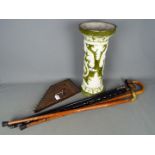 Lot to include a small collection of walking sticks, small harp and other.