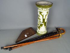 Lot to include a small collection of walking sticks, small harp and other.