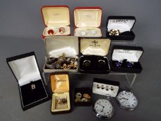 A collection of various cufflinks (including a hallmarked silver pair) and dress studs and two