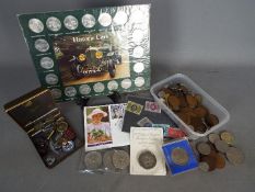 A mixed lot to include coins, a small quantity of stamps, enamelled pin badges and similar.