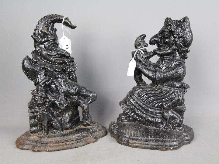 A pair of cast iron doorstops in the form of Mr Punch & Judy and one other. - Image 2 of 3