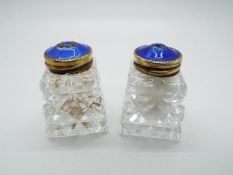 A pair of Hroar Prydz, silver gilt and guilloche enamel, cut glass cruets,
