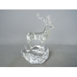 A studio glass, lamp worked figurine by Neil Harris depicting a stag, signed and dated to the base,