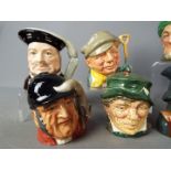 Royal Doulton - A collection of nine small Royal Doulton character jugs and ashtrays comprising