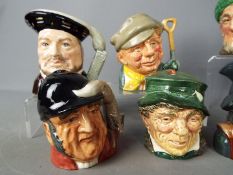 Royal Doulton - A collection of nine small Royal Doulton character jugs and ashtrays comprising