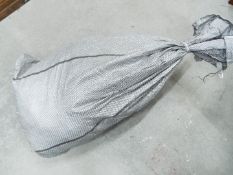 Costume Jewellery - A sealed sack containing approximately 26.5 Kg of unsorted costume jewellery.