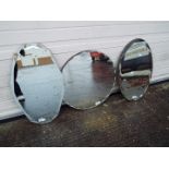Three wall mirrors, largest approximately 56 cm (d).