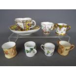 A small collection of miniature ceramics comprising a Royal Worcester / Grainger & Co blush ivory