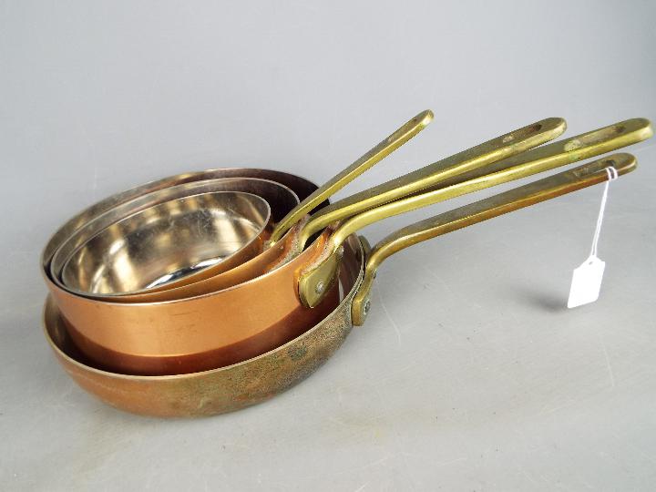 A set of four good quality copper cooking pans. - Image 2 of 3