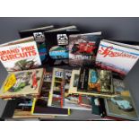 A collection of books, predominantly hardback relating to motor vehicles, sports cars,