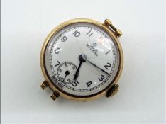 A lady's 9ct gold cased Record wristwatch (lacking bracelet), approximately 11.9 grams all in.