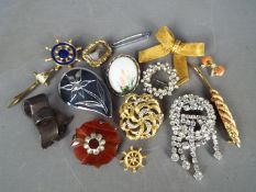 Brooches - Fourteen brooches all various designs to include a white metal (unmarked),