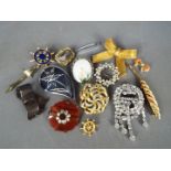 Brooches - Fourteen brooches all various designs to include a white metal (unmarked),