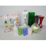 A collection of glassware to include vases, ships decanter,