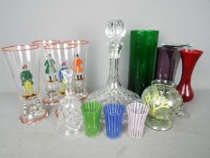 A collection of glassware to include vases, ships decanter,