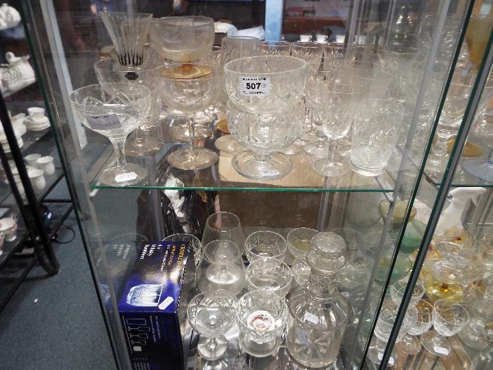 Glassware - a quantity of drinking glasses, crystal glasses,