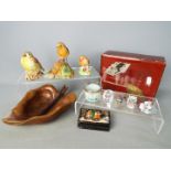 A mixed lot to include Oriental lacquered box, bird figurines including Royal Worcester,