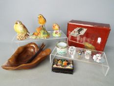 A mixed lot to include Oriental lacquered box, bird figurines including Royal Worcester,