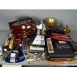 General - A box containing mixed items including a kitchen scale with weights,